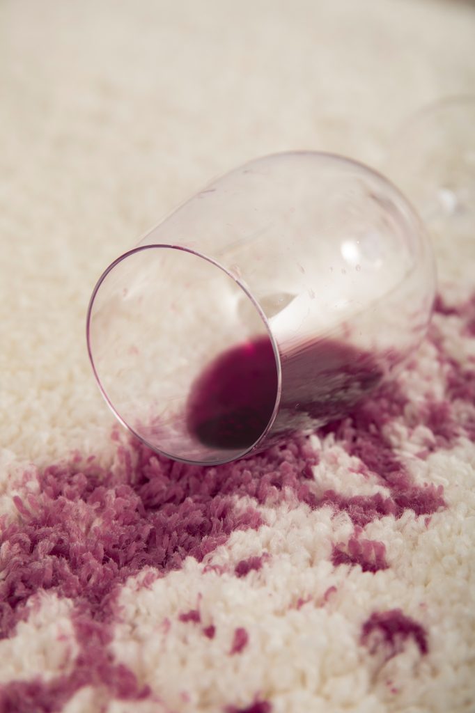 Wine spilled on carpet before service from the best carpet cleaners Reno homeowners trust